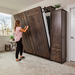 woman opening Murphy Bed